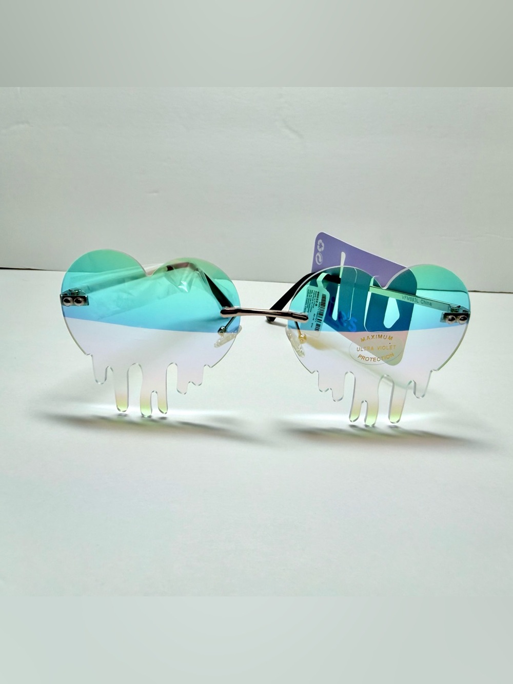 Claire's Iridescent Heart Drip Rimless Sunglasses